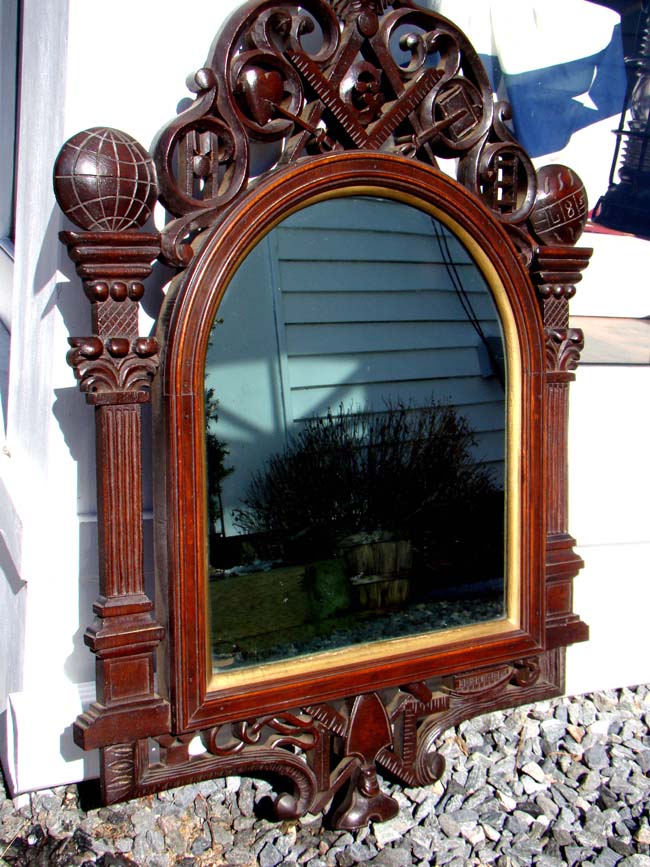 A RARE carved walnut Masonic Mirror circa 1868 carved by JOHN HALLEY BELLAMY (1836-1914)